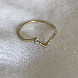Dainty 14k gold ring with small diamond